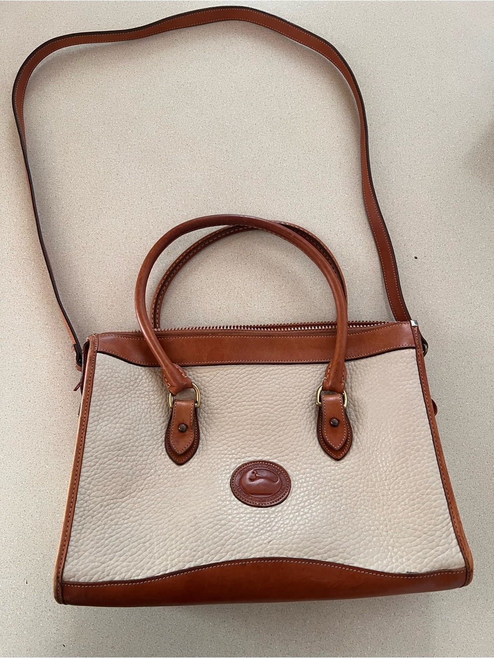 Dooney & Bourke Cream and Brown Pebbled Leather Satchel